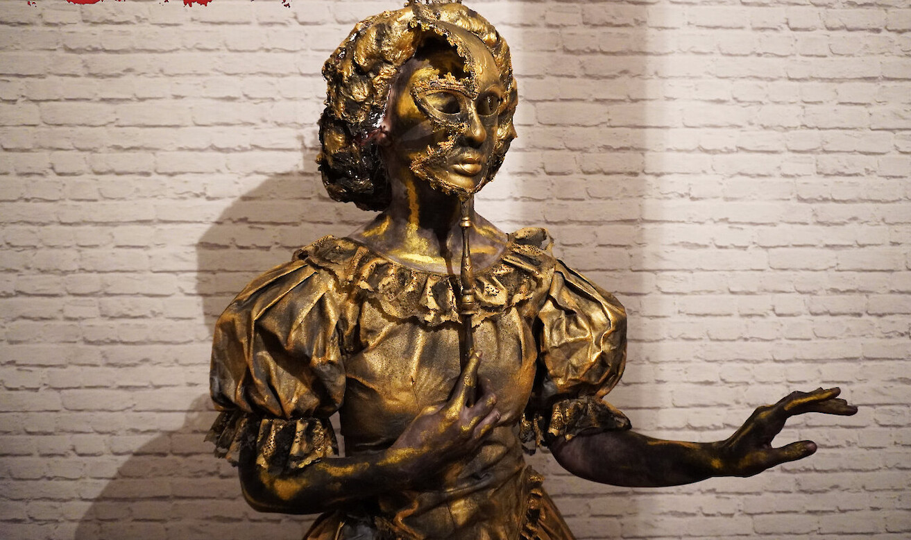 masquerade human statue